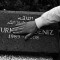 Sarajevo, Bosnia and Herzegovina 2011. Nihad Bostandja, 23 years old, member of a little gang in the city, on the grave of his friend Deniz, killed in 2008. Deniz was shoot in the back at the age of 18 years. Photo - Matteo Bastianelli