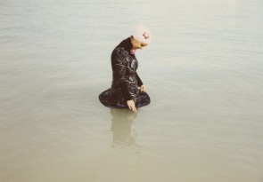 Olivia Arthur. Diana bathing in her Islamic swimsuit. Jeddah, 2009