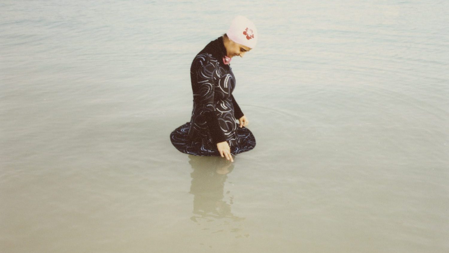 Olivia Arthur. Diana bathing in her Islamic swimsuit. Jeddah, 2009