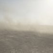 Michele Palazzi. Mongolia, Gobi, Omongovi, 2013. Coal dust raised by the wind in the Tavan Tolgoi mine.