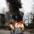 Christopher Nunn. Burning Security Service of Ukraine vehicle, Kalush, 19th February 2014. "A Row of Bones"